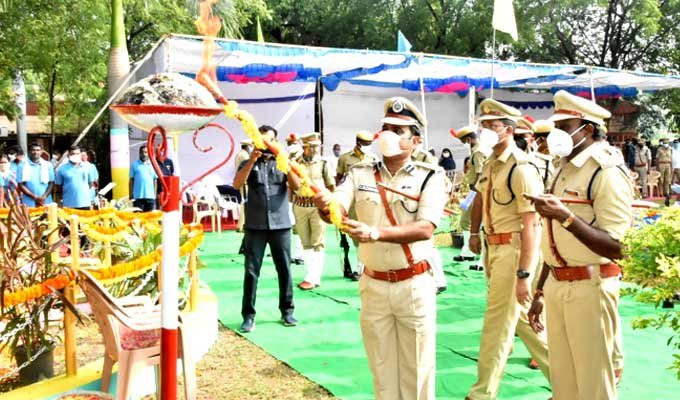 CP Satyanarayana lighting the torch at the Martyrs' Stupam