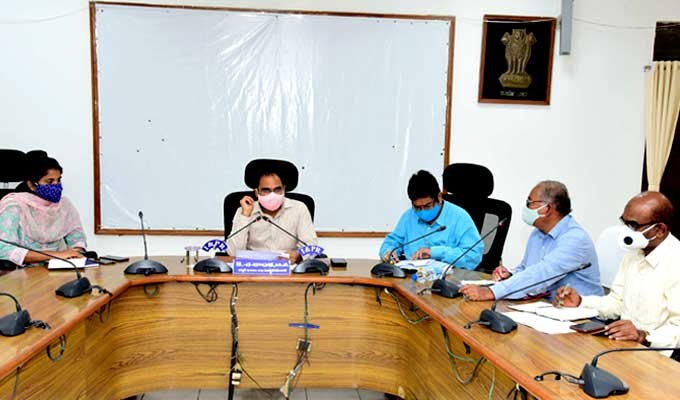 Collector speaking at review meeting