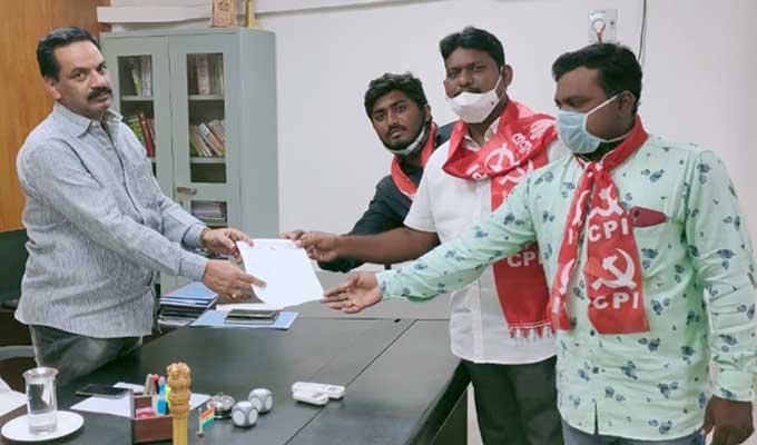 CPI leaders handing over petition to Additional District Collector V. Lakxminarayana